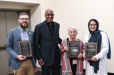 Stated Clerk J. Herbert Nelson, II stands with Ecumenical and Interreligious Service Award winners Wes Pitts, Margee Kooistra and Farzama Q. Safiullah.