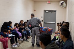 Central Americans awaiting processing in McAllen Texas after crossing the border into the U.S.