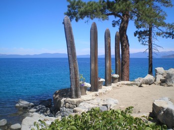 The “chancel” of the outdoor worship space at Zephyr Point features four wooden pillars, representing the four gospels.