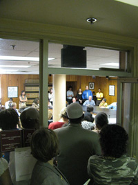 Supporters of Street Grace pack an Atlanta hearing room to show support for the rights of exploited women in the city.