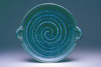 A  turquoise communion ware, with spirical markings