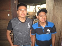 Carlos (left) and Jorge in their home outside of Sayaxche, Guatemala.