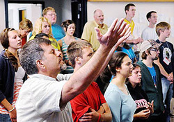 In a song during a session for young adults on Tuesday at the 104th New Wilmington Mission Conference at Westminster College in New Wilmington, Lawrence County