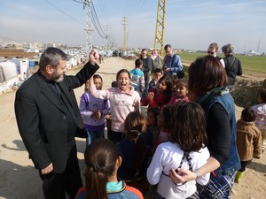 Rev. Fadi Dagher visits with Syrian refugee children 