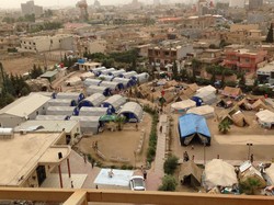 Winterized tents on the grounds of the Chaldean Church in Erbil, Iraq, house displaced persons fleeing the advance of ISIS in Mosul and other northern cities.