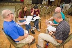 Chaplains gather in small groups to rework previously prepared sermons during the homiletics workshop at the PCCMP retreat at Montreat. 