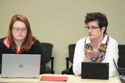 DeEtte Huey, right, a Master of Arts in Marriage and Family Therapy student at Louisville Seminary, shares her thoughts in Christine Hong's "Multifaith Perspectives on Global Displacement" class. To her left is Master of Divinity student Lauren Brague.