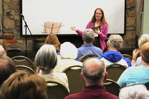 Rebecca Barnes, associate with Environmental Ministries, leads conference attendees through the opening worship service of the 2015 Presbyterian Earth Care Conference.