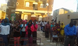 Members of the Sudan Presbyterian Evangelical Church pray for an end to attacks of church property.