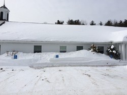 Windham Presbyterian Church in New Hampshire is blanketed by last winter’s record snow. 