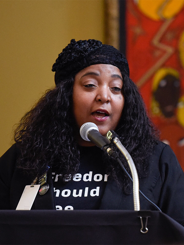 Shameka Parrish-Wright, site manager for the Bail Project in Louisville, describes the challenges people face who cannot post bail. Photo by Rich Copley.