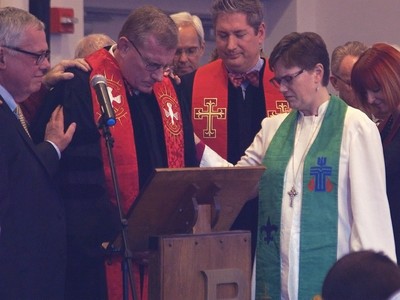 Rev. Cindy Kohlmann takes part in the installation of Rev. Dr. John H. Siders as pastor for Windham Presbyterian Church. 