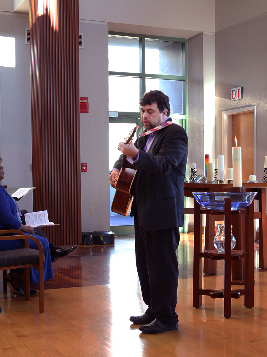 David Gambrell, associate for worship with the Presbyterian Mission Agency’s Office of Theology and Worship, led music during a memorial service for the Reverend Robina Winbush and Mike Miller at the Presbyterian Center. Photo by Randy Hobson