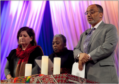 Eliana Maxim (left), Terry McCrae Hill (center), and Wajdi Said (right) lead a prayer litany for the victims of Charleston and Orlando.