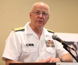 Rear Admiral Mark Tidd speaks on behalf of the Presyterian Council for Chaplains and Military Personnel at GA 220. 