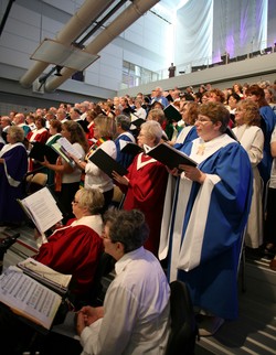 A picture of the large choir singing