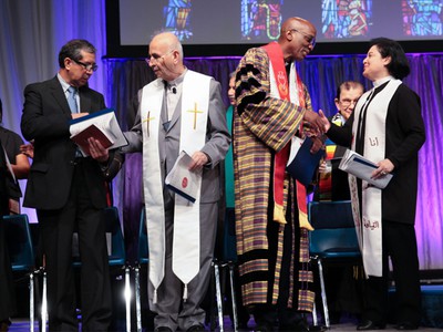 Stated Clerk J. Herbert Nelson asks Presbyterians and Ecumenical friends Pass The Peace at the Ecumenical Worship service during the 223rd General Assembly (2018) in St. Louis.
