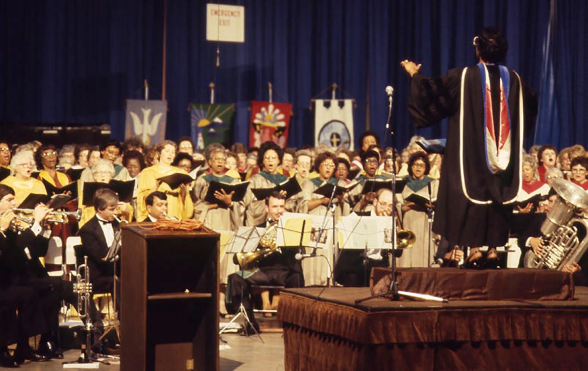 Melva Costen leads a choir at the 1983 General Assembly.