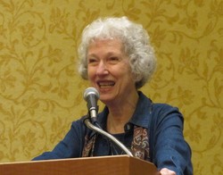 Photo of a woman at a podium