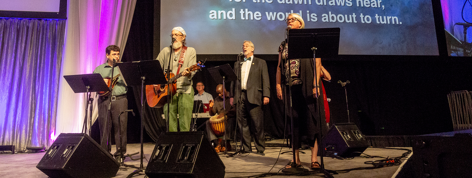 Chip Andrus (second from the left) performs at GA223 with (left to right) David Gambrell, Sheldon Sorge, Alonzo Johnson, Bill McConnell and Deb Avery. Photo by: Gregg Brekke.