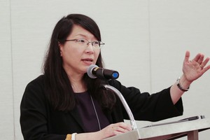 Nan Kim speaking at the Presbyterian Peace Network for Korea luncheon