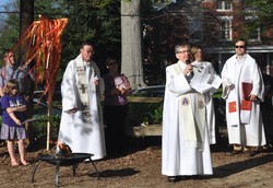 Rev. Cynthia Campbell, center, speaks at the Easter Vigil in 2014 at Highland Presbyterian Church in Louisville, Kentucky. Also participating in the service are Rev. Fred Holper, left, Rev. Ann Deibert of Central Presbyterian in Louisville and Rev. Matt Nickel, Associate Pastor of Highland.