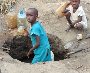 With no options to obtain fresh water, school-age children fetch contaminated water to drink and use in cooking.