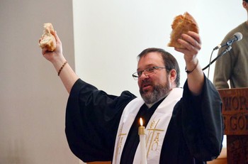 The Rev. Dr. Chip Andrus celebrates communion at South Salem (New York) Presbyterian Church.