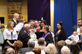 Emily Chudy welcomes new children and families into life at Central Presbyterian through the sacrament of baptism.