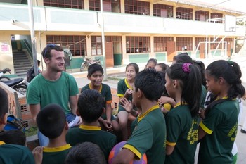 Daniel Pappas with youth in Peru.