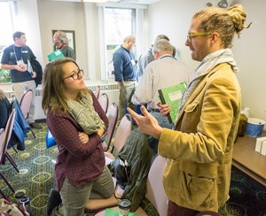 Jane Larson, a PC(USA) seminarian at Pittsburgh Theological Seminary, and the Rev. Chad Collins, pastor at Valley View Presbyterian Church in Pittsburgh, talk about current issues at the 2015 IPMN gathering.
