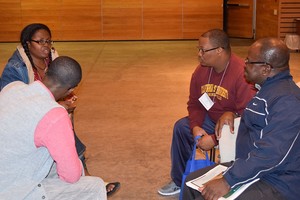 Tega Swann, Samuel Yenn Batah, Stephen Robertson and Benjamin Kwasi Aye-Addo gather together for small group discussion during the 37th annual Racial Ethnic & New Immigrant Seminarians Conference.