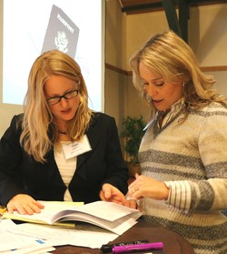 World Mission staff members Ellen Sherby (left) and Rachel Yates (right) lead a conference session.