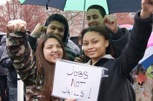 Youth participate in a “Jobs Not Jails” rally at Boston Common.