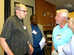 Rob Weingartner, executive director of the Outreach Foundation (left) speaks with Davidson Chifungo, Nkoma Synod, CCAP, following his missional focus group.