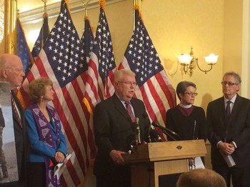 The Rev. Gradye Parsons speaks at a press conference concerning welcome of refugees with other religious leaders and U.S. Senators.