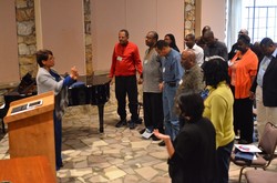 African American clergywoman leads worship