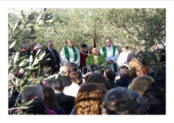 Pastors Michel Sabbah and Abuna Shomali conduct a communion service for Christians non-violently protesting the construction of Israel’s separation barrier in an area of the Cremisan Valley that will cut a monastery off from a convent and school the monks and nuns jointly operate. 