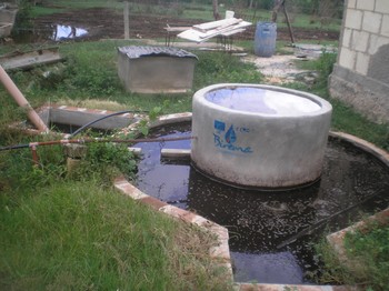 Peasant farmers at Demari use bio-gas processors to produce compost and energy.