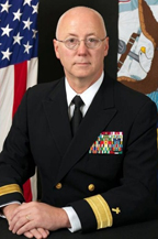 Mark Tidd wearing Navy uniform, posing for a photo