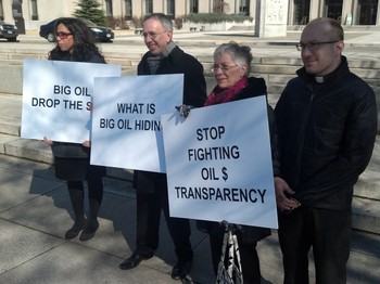 Presbyterian clergy join other supporters outside a DC appeals court after hearings during an anti-transparency lawsuit filed by the oil industry.