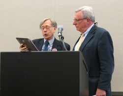 John Buchanan (right) receives award from John Underwood, PWG president