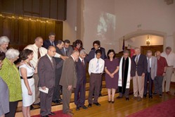 Members of the Mideast Evangelical Church in South Pasadena pray for Maher Makar. 
