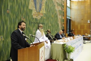 Fr Daniel Buda (left) speaking at the Global Energy Parliament in Geneva. 