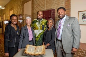 The Howard University School of Divinity delegation returning the ‘Tweed MS150’ text to Ethiopia pictured with the manuscript. 
