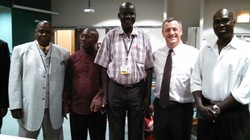 Pastors gather at Orangewood Presbyterian Church in Phoenix, Arizona to hear from Peacemaker, the Rev. James Ninrew from South Sudan (center) in 2014.