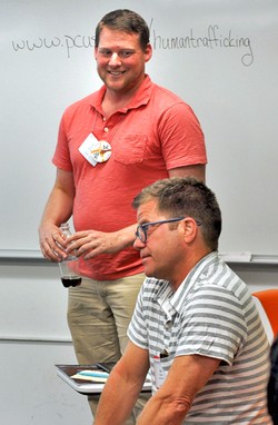 Ryan Smith (standing), Presbyterian Representative to the United Nations and Carl Horton, mission coordinator for peacemaking