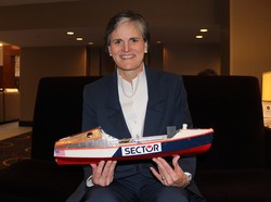 Tori Murden McClure, president of Spalding University in Louisville, Ky., poses with a replica of the rowboat she used in 1999 to become the first woman to row alone across the Atlantic Ocean. She had just spoken to fellow presidents of the National Association of Independent Colleges and Universities in Washington, D.C., on Feb. 4, 2015
