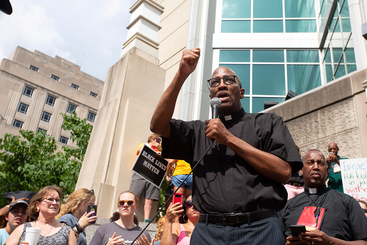 Stated Clerk, the Rev. J. Herbert Nelson, II, speaks at the No Cash Bail March in St. Louis on June 19, 2018. (Photo by Michael Whitman)