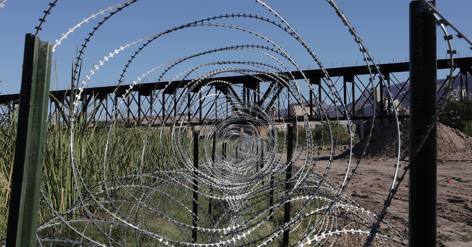 El Paso, TX USA, October 12, 2023 Razor barb wire along Rio Grande to prevent migrants from crossing.